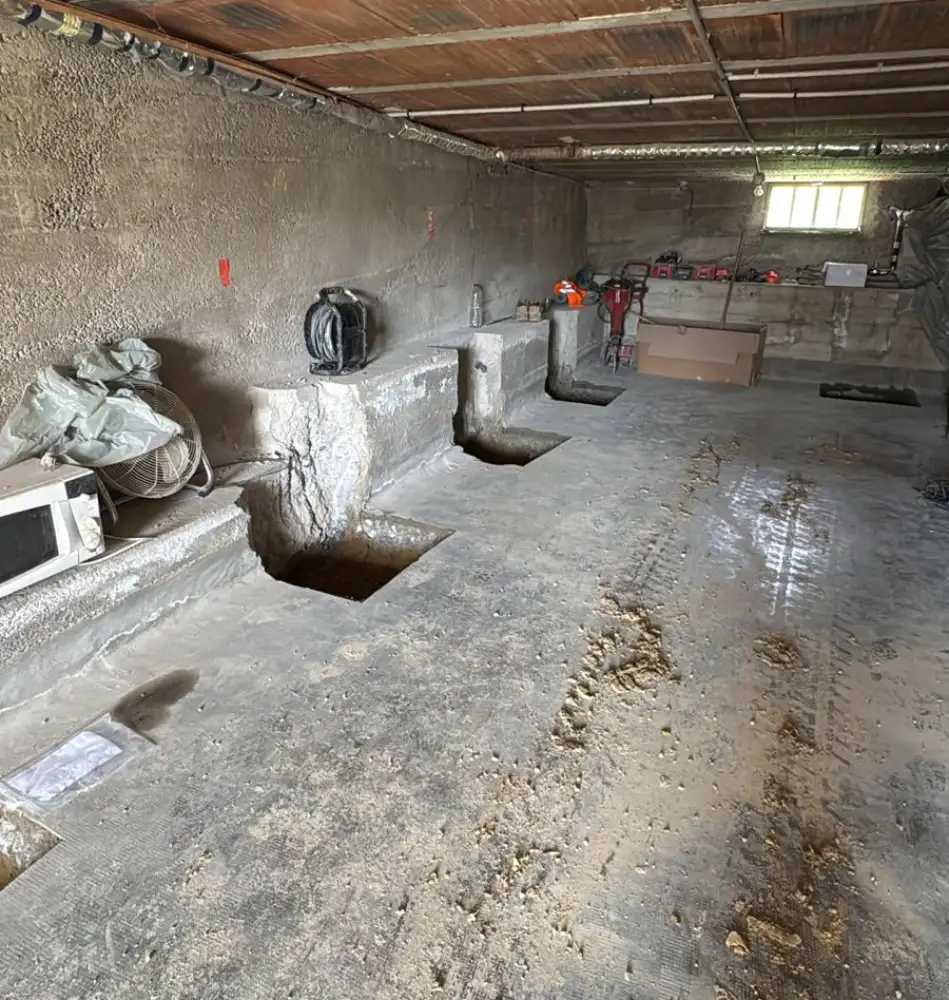 Points de forage pour micropieux dans le vide sanitaire de la maison